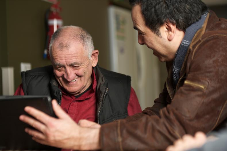 Disability worker interacting with a man with a disability